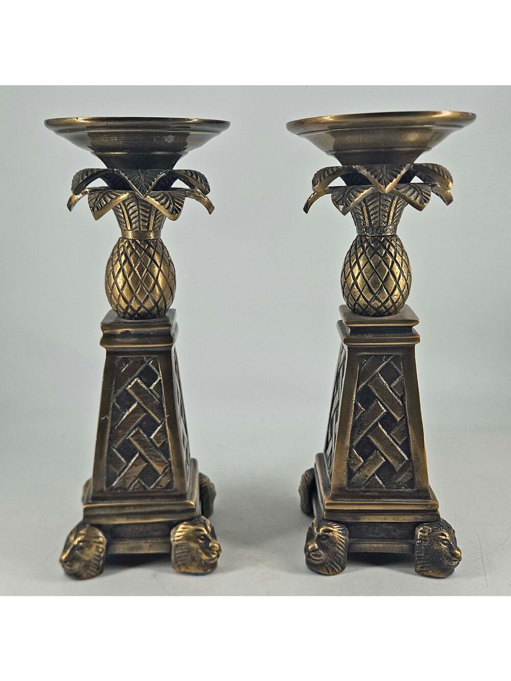 Vintage pair of heavy brass lion head palm pineapple candle Holder